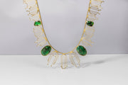 Todd Reed necklace with emerald slices (~28.87ct), white brilliant cut diamonds (~1.79ct), and 18k yellow gold.